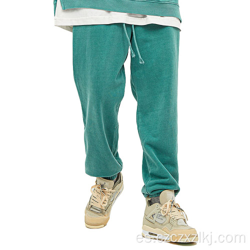 Pantalones de chándal de color sólido de moda de Terry desgastado
